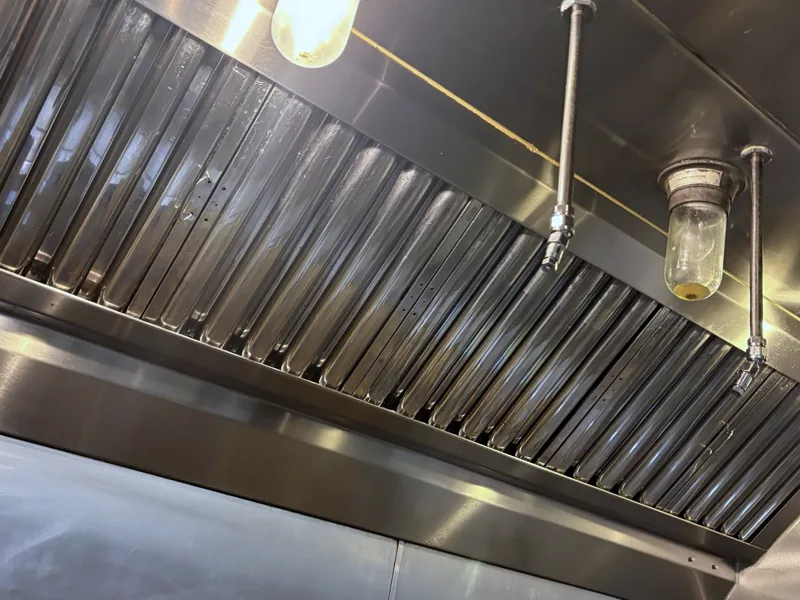 Brewery hood canopy after cleaning, filter bank and canopy bright stainless, Georgetown.