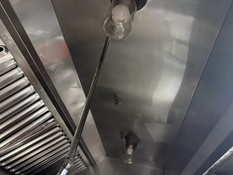 Restaurant hood canopy after cleaning, canopy and filters bright and clean, Denver.