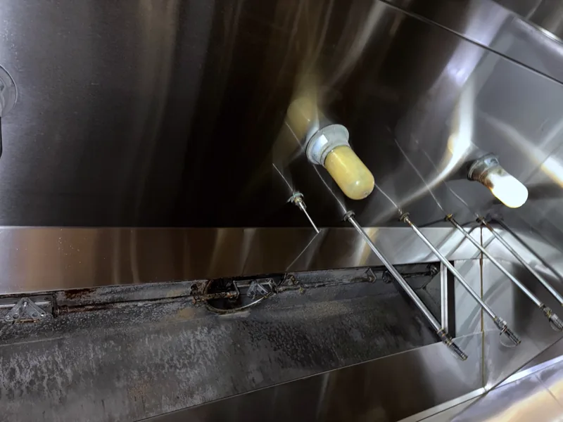 Grocery store hood plenum after cleaning, clean bright stainless, Glenwood Springs.